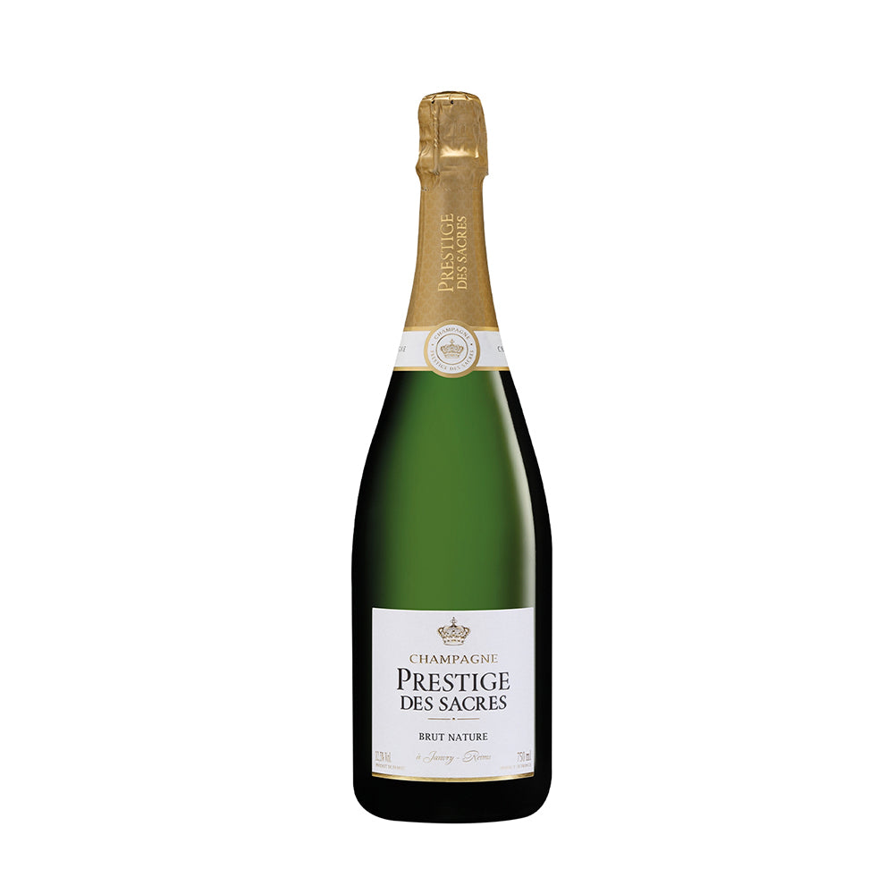 Brut Nature Champagne Prestige des Sacres bottle featuring elegant design and golden foil.