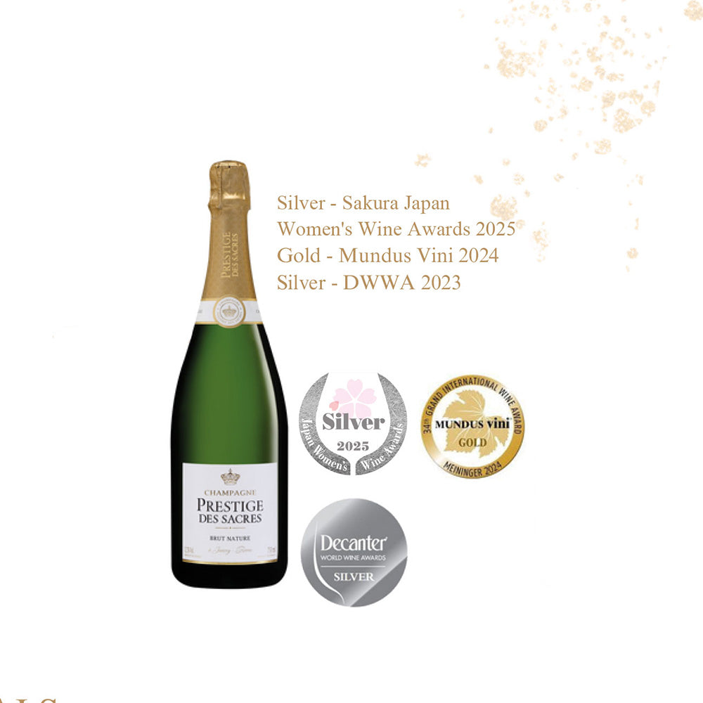 Brut Nature Champagne Prestige des Sacres bottle with awards including Silver at Sakura Japan and Gold at Mundus Vini.